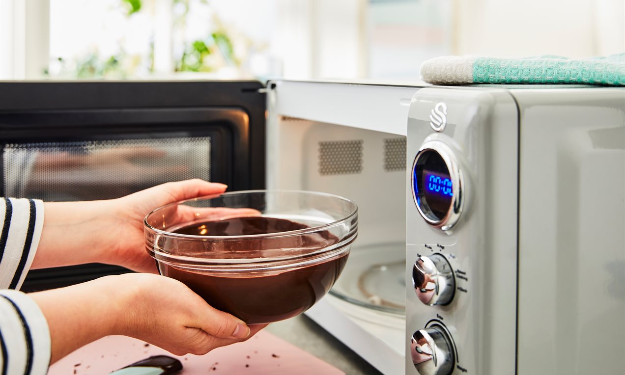 Removing Bowl of chocolate from Microwave